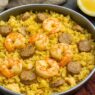 AIP Chicken Paella with shrimp, chicken, and sausage in a grain-free cauliflower rice base; paleo, gluten-free, dairy-free, and autoimmune-friendly