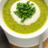 AIP-friendly Acorn Squash and Cauliflower Soup, gluten-free, dairy-free, nightshades-free, gut-healing, served in a bowl with fresh cilantro garnish