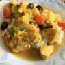 AIP Moroccan chicken tagine with vegetables, served in a traditional tagine pot, a gluten-free and paleo-friendly dish.