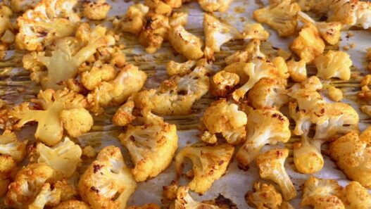 Roasted Cauliflower with garlic, turmeric, and spices, a healthy anti-inflammatory side dish perfect for the Autoimmune Protocol Diet