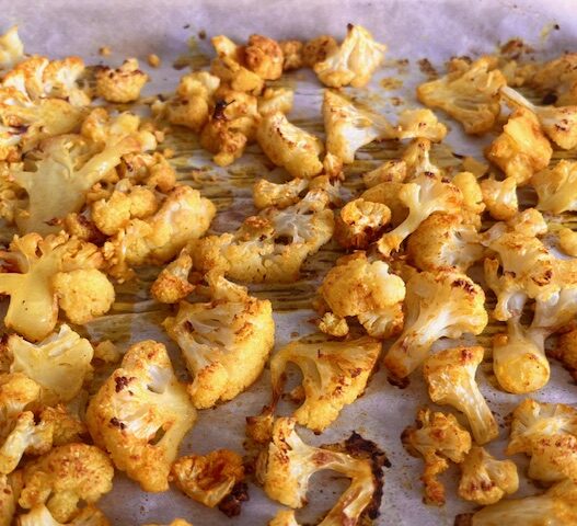 Roasted Cauliflower with garlic, turmeric, and spices, a healthy anti-inflammatory side dish perfect for the Autoimmune Protocol Diet