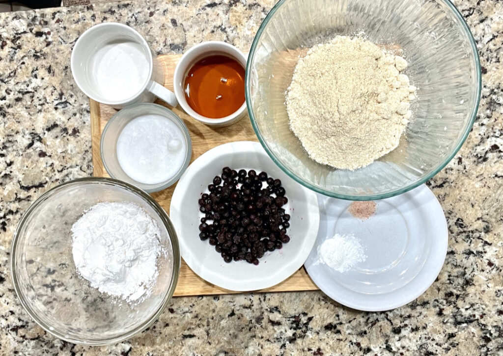 Ingredients for AIP Blueberry Scones: tigernut flour, tapioca flour, coconut oil, maple syrup, gelatin eggs, blueberries, and coconut milk, perfect for Autoimmune Protocol Diet