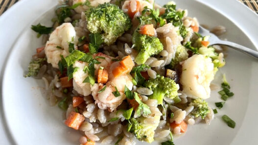 AIP-friendly Garlic Shrimp Cassava Orzo featuring juicy shrimp, vibrant carrots, celery, broccoli, and gluten-free cassava orzo, garnished with parsley