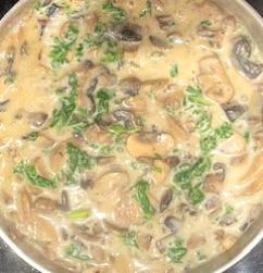 Creamy mushroom kale sauce made with coconut milk, sautéed mushrooms, and kale. AIP-friendly, dairy-free, gluten-free.