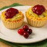 AIP-friendly sweet potato cups with leeks and cranberry sauce, a gluten-free, autoimmune-friendly, nutrient-dense appetizer full of vitamins and antioxidants.