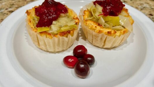 AIP-friendly sweet potato cups with leeks and cranberry sauce, a gluten-free, autoimmune-friendly, nutrient-dense appetizer full of vitamins and antioxidants.