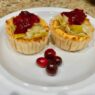 AIP-friendly sweet potato cups with leeks and cranberry sauce, a gluten-free, autoimmune-friendly, nutrient-dense appetizer full of vitamins and antioxidants.