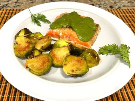 Roasted Brussels sprouts for AIP diet, caramelized with apple cider vinegar and maple syrup, served as a healthy, anti-inflammatory, gut-friendly side dish.