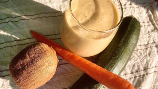 Kiwi, carrot, zucchini smoothie with coconut yogurt and ginger, an AIP breakfast or snack, rich in vitamins, minerals, antioxidants and probiotics.