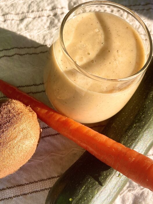 Kiwi, carrot, zucchini smoothie with coconut yogurt and ginger, an AIP breakfast or snack, rich in vitamins, minerals, antioxidants and probiotics.