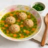 AIP and gut-friendly Meatball Borscht (Ciorba de Perisoare), a nourishing Romanian soup made with bone broth, vegetables, and sauerkraut juice for autoimmune health and wellness.