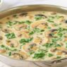 Mushroom Kale Sauce in Creamy Coconut Base with sautéed mushrooms and wilted kale in a dairy-free, gluten-free, paleo, AIP-friendly creamy coconut sauce