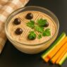 AIP Chicken Liver Pate served in a bowl, garnished with herbs, showcasing a creamy, nutrient-rich spread perfect for autoimmune-friendly diets.