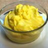 Close-up of a bowl with creamy homemade mayonnaise, suitable for AIP egg yolk reintroduction phase.