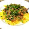 A Spaghetti Squash Bowl featuring roasted spaghetti squash strands topped with savory ground beef, sautéed vegetables, and wilted kale, garnished with fresh parsley. Perfect for AIP, Paleo, and gluten-free lifestyles.