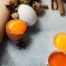 Fresh egg yolks inside their shells, showcasing vibrant color and smooth texture, perfect for Stage 1 Reintroduction phase recipes