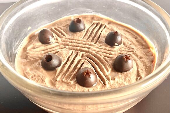 AIP Chicken Liver Pate served in a bowl, garnished with herbs, showcasing a creamy, nutrient-rich spread perfect for autoimmune-friendly diets.