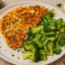 AIP chicken breast schnitzel served with steamed broccoli, gluten-free, grain-free, low-oxalate and autoimmune protocol-friendly meal.