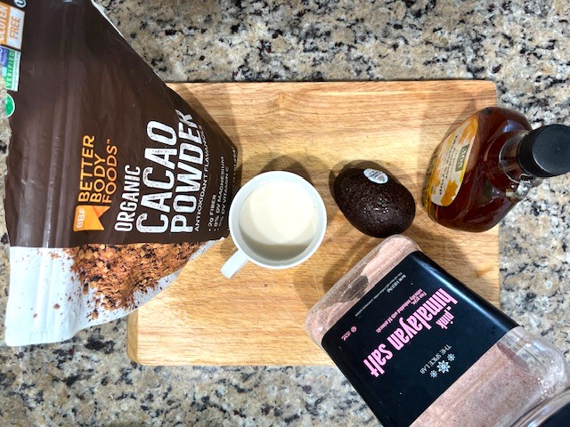 Ingredients for Cacao Avocado Pudding: ripe avocado, cacao powder, coconut milk, maple syrup, and sea salt, gluten-free, dairy-free, nut-free, and nightshade-free.