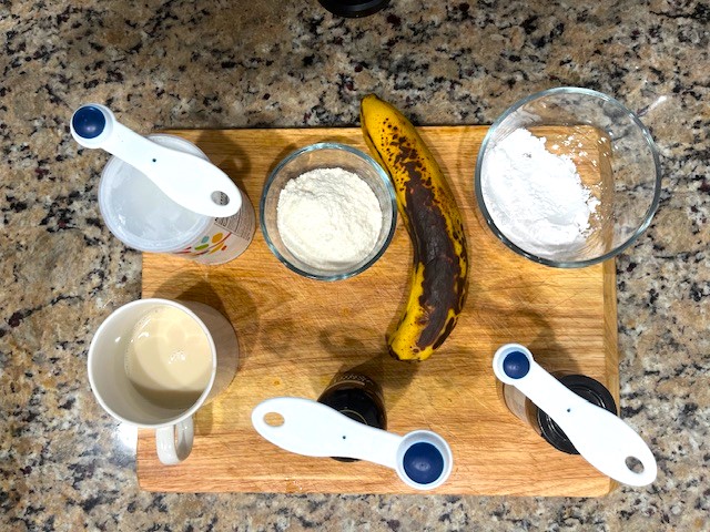 All ingredients for Delicious AIP Banana Pancakes displayed on a countertop—gluten-free, dairy-free, and AIP-compliant.