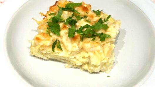 Shrimp and Potato Gratin served on a plate, topped with fresh parsley. Gluten-free, nightshade-free, and AIP reintroduction-friendly.