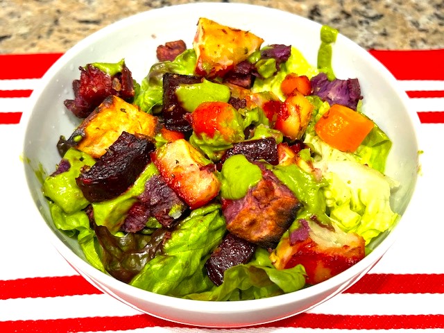 A bowl of Lettuce & Roasted Root Veggies Salad – a gluten-free, dairy-free, AIP-compliant, and autoimmune-friendly recipe.