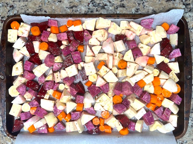 Chopped root vegetables ready for roasting in Lettuce & Roasted Root Veggies Salad – a gluten-free, dairy-free, AIP-friendly recipe.