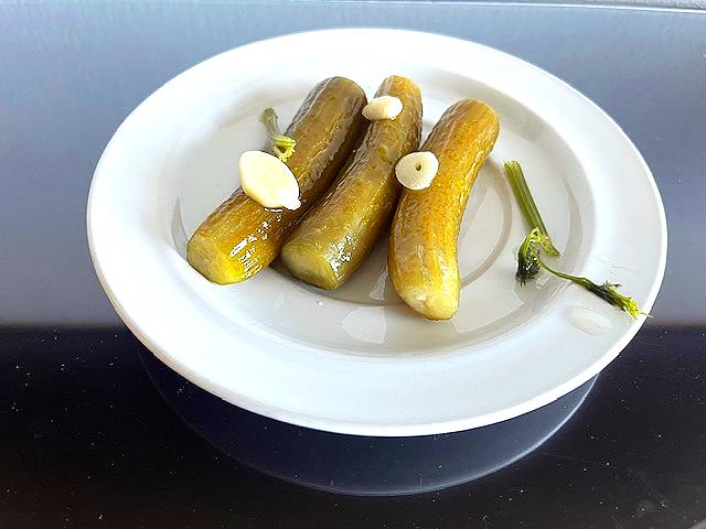 Homemade AIP Pickles with garlic, dill, and horseradish, fermented for a healthy, probiotic-rich snack