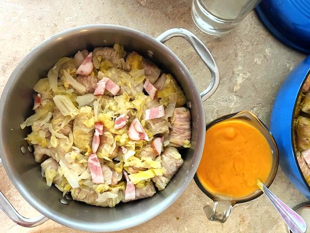 Finished Romanian Cabbage Rolls (Sarmale) in a pot, ready for the no-tomato sauce.