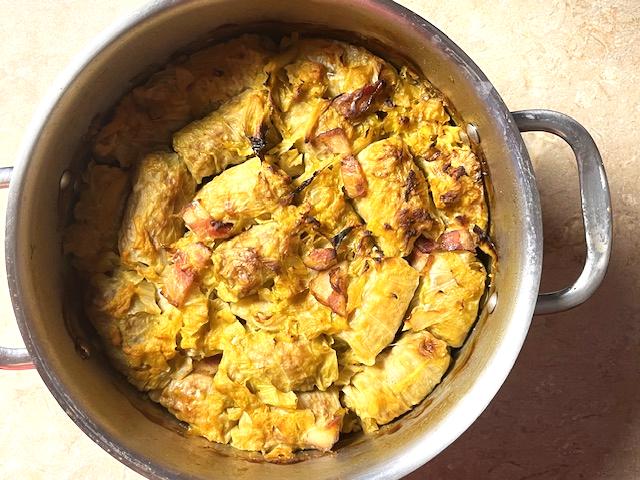 Golden, crispy Romanian Cabbage Rolls (Sarmale) freshly out of the oven, perfectly cooked and ready to serve.