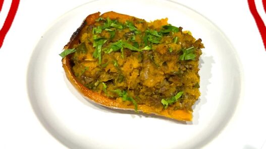 Savory Stuffed Butternut Squash on a plate, a delicious AIP reintroduction recipe that’s gluten-free, dairy-free, and nutrient-packed.