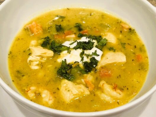 AIP Cioppino, a seafood stew made with shrimp, salmon, and mahi-mahi, in a rich tomato-free broth with carrots, onion, and herbs. Gluten and dairy free.