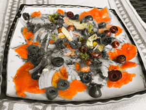 smoked salmon plate, AIP appetizer, with anti-inflammatory ingredients including onions, black olives, fresh dill, olive oil, and apple cider vinegar – perfect for autoimmune and paleo diets.