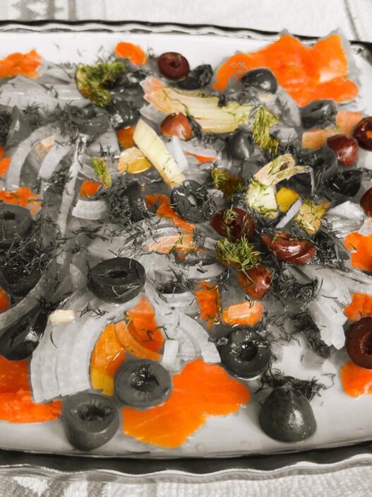 smoked salmon plate, AIP appetizer, with anti-inflammatory ingredients including onions, black olives, fresh dill, olive oil, and apple cider vinegar – perfect for autoimmune and paleo diets.