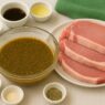 Savory Pork Chops Marinade with raw pork chops, lemon, herbs, and spices – a flavorful, gluten-free, dairy-free, anti-inflammatory AIP-friendly recipe.