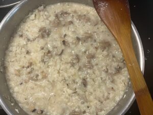 AIP Creamy Mushroom Risotto cooking step with cauliflower rice and mushrooms in coconut milk, autoimmune protocol recipe, grain free dairy free dinner