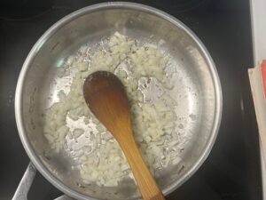 AIP Creamy Mushroom Risotto cooking onions in stainless steel pan, step by step autoimmune protocol recipe, grain free dairy free comfort food