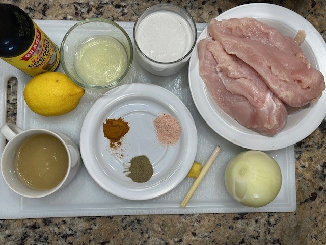 AIP Thai Coconut Chicken ingredients including chicken breast, coconut milk, lemon juice, bone broth, turmeric, kelp, onion, ginger, lemongrass, coconut aminos, and sea salt.