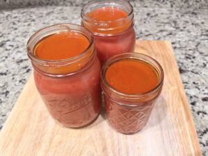 Best No-Tomato Sauce stored in glass jars on wooden board, nightshade free, dairy free, gluten free, AIP compliant healthy sauce