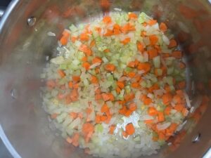 Cabbage and Potato Soup vegetables sautéing dairy free gluten free AIP-friendly base with onion, carrot, and celery in avocado oil