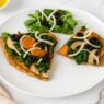 Tasty AIP Pizza Crust on marble table, topped with kale, mushrooms, and olives, served with a fresh salad — healthy, gluten-free, gut-friendly, and perfect for autoimmune diets.
